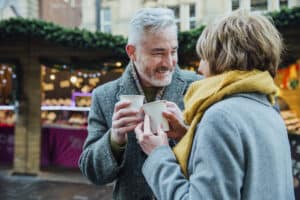 Couple having coffee on the street