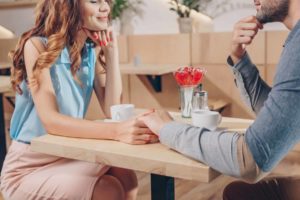 A man and a woman sitting at a table