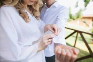 A man and a woman standing next to each other