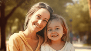 A woman and a little girl posing for a picture